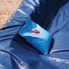 Close up of wall bag - fill them up and set them down or tie them to your cable.  Keeps cover secure all winter long.