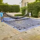 2 Year Inground Deluxe Leaf Net being removed from pool