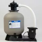 Angled front-side view of a pool pump showing the pump housing, clear strainer lid, and connected plumbing at the intake and discharge ports.