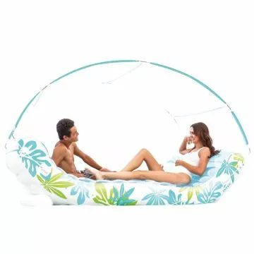 Man and woman lounging on the Intex Tropical Canopy Lounge