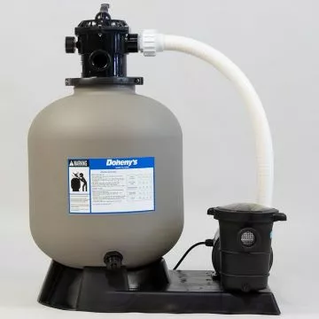 Angled front-side view of a pool pump showing the pump housing, clear strainer lid, and connected plumbing at the intake and discharge ports.
