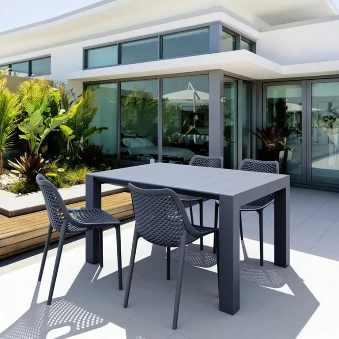 View Compamia Air 5 Piece Resin Outdoor Dining Set in Dark Gray on patio