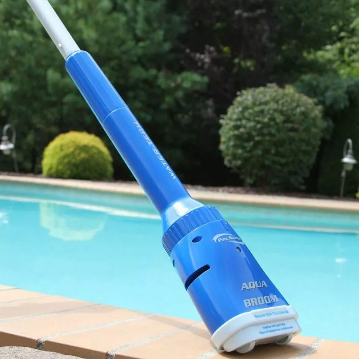 Aqua Broom Handheld Pool Vacuum lifestyle view at ledge of pool